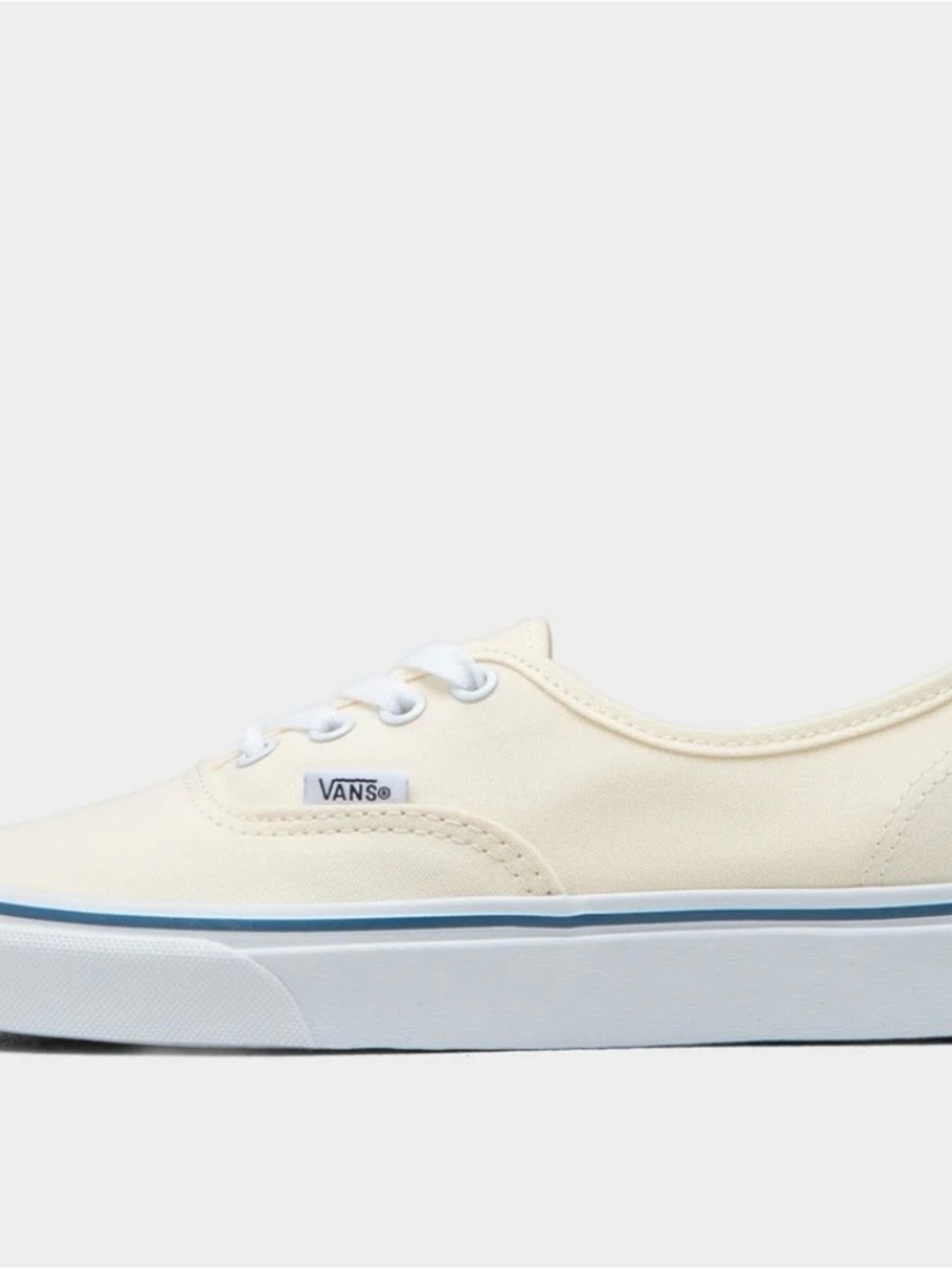 Vans Low-Top Canvas Sneaker in Off-White with Blue Trim